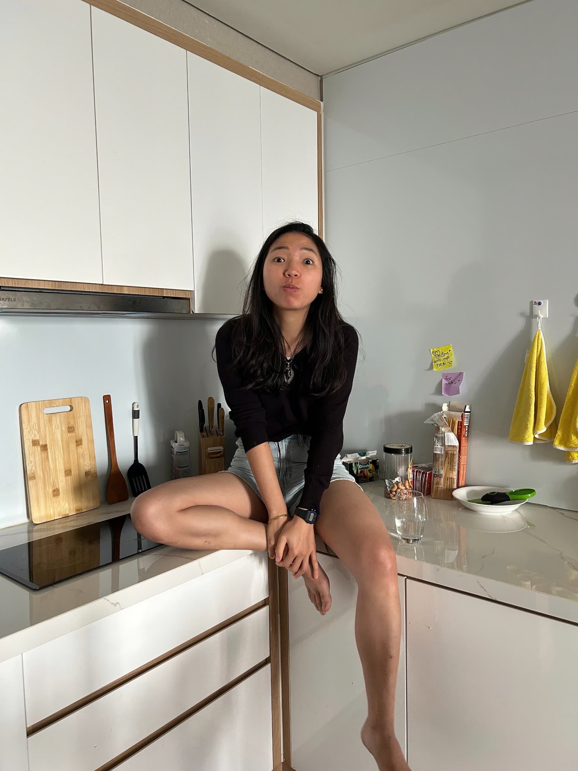 Hanny sitting in her favorite kitchen counter